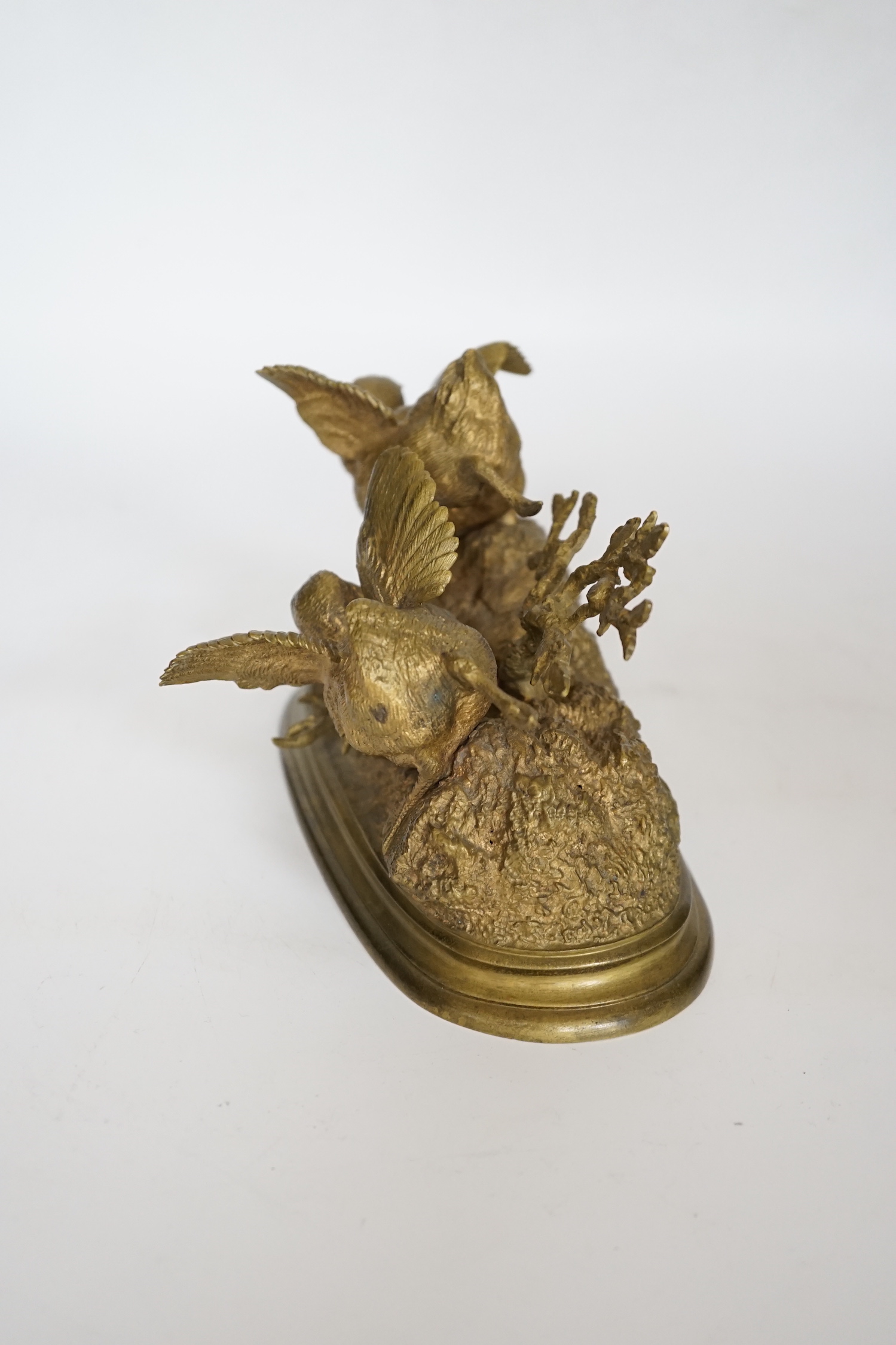 Ferdinand Pautrot (1832 - 1874), a French gilt bronze group of two birds, signed and inscribed Beaux Arts, 19cm wide